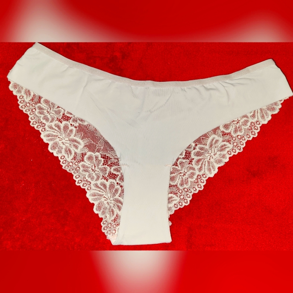 XOXO Pale pink lace thong size M